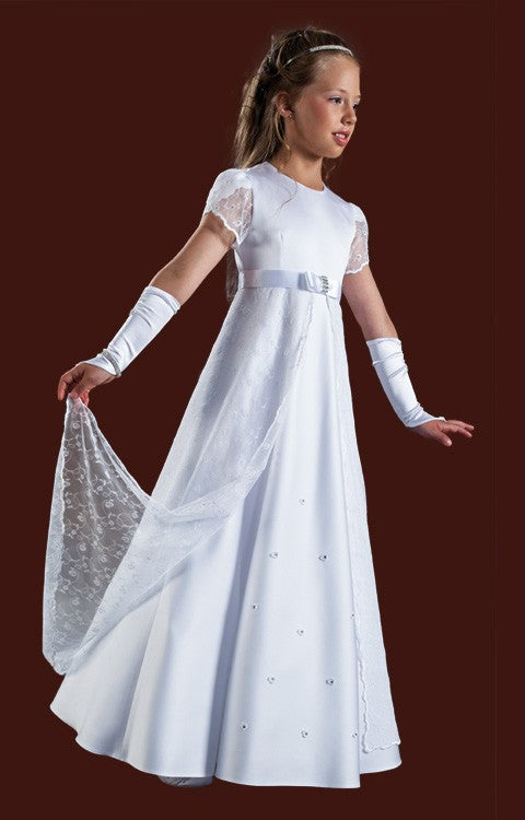A girl wearing a brand-new white communion dress with a beaded stole